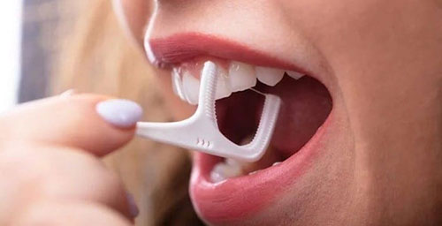طرز استفاده از نخ دندان
